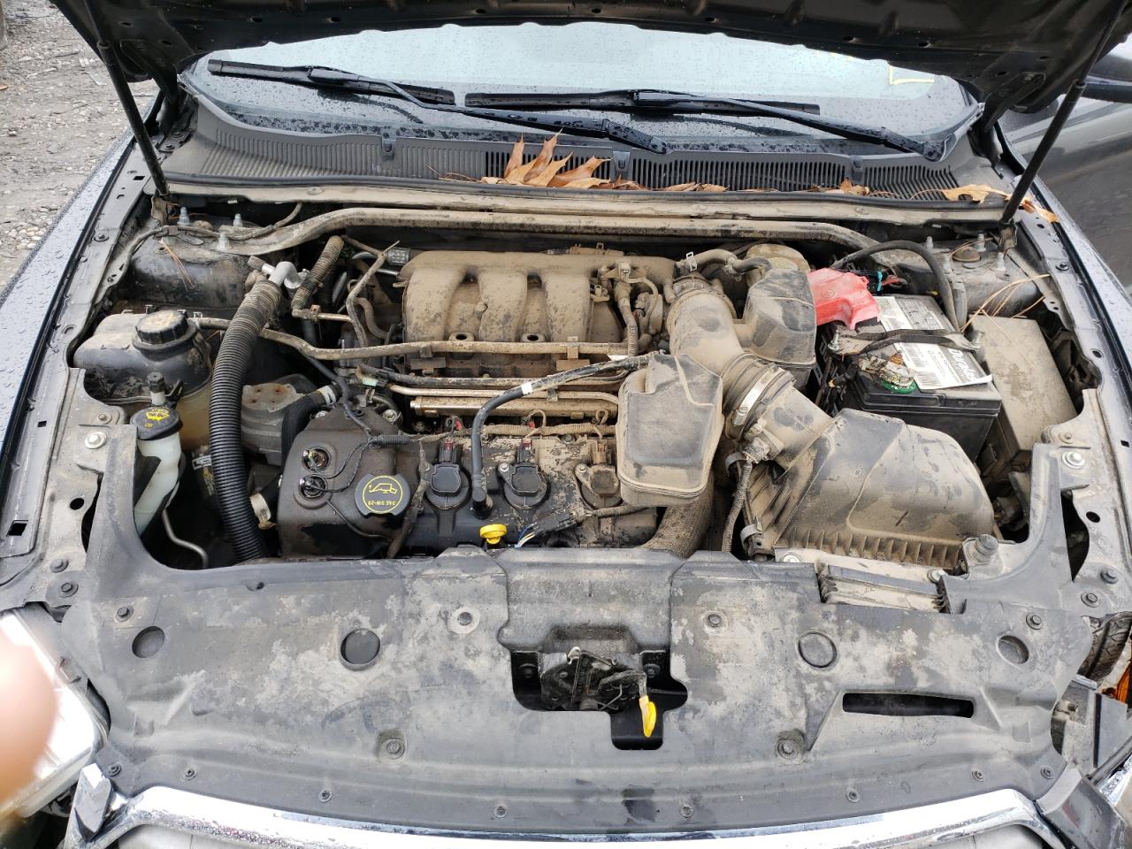 Photo 7 from auction – 2015 FORD TAURUS SEL with VIN 1FAHP2E80FG134053