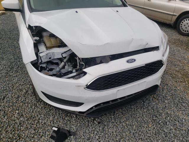 Photo 9 from auction – 2018 FORD FOCUS with VIN 1FADP3F28JL318624
