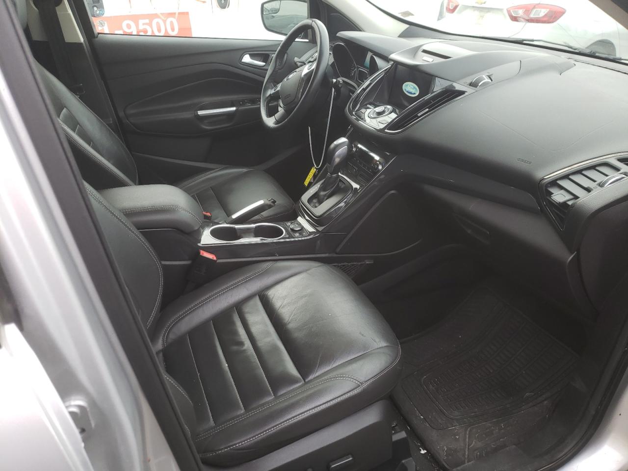 Photo 5 from auction – 2016 FORD ESCAPE TIT with VIN 1FMCU0J99GUA84316