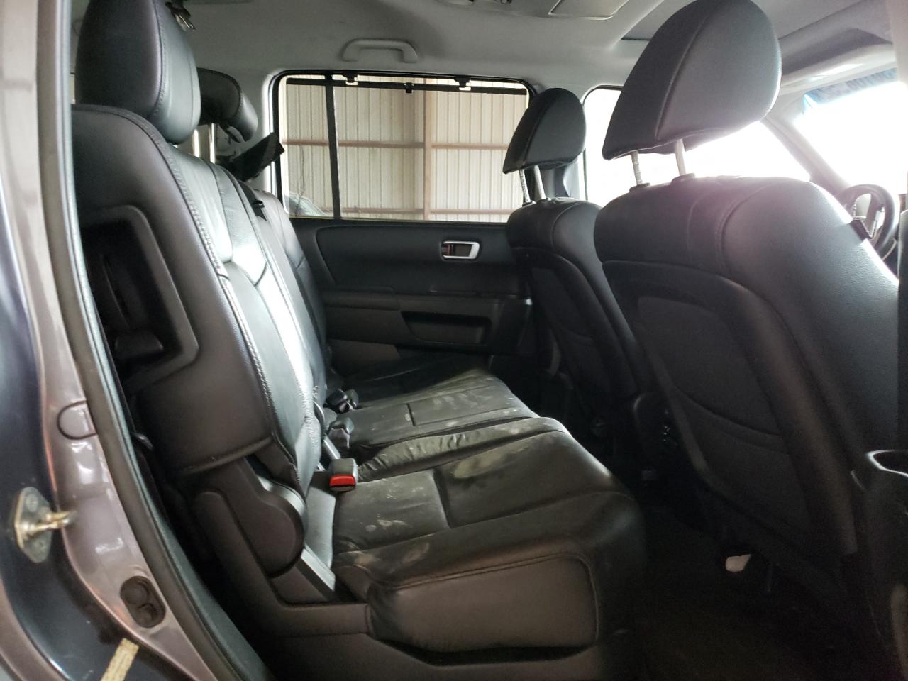 Photo 6 from auction – 2014 HONDA PILOT TOUR with VIN 5FNYF3H99EB006443