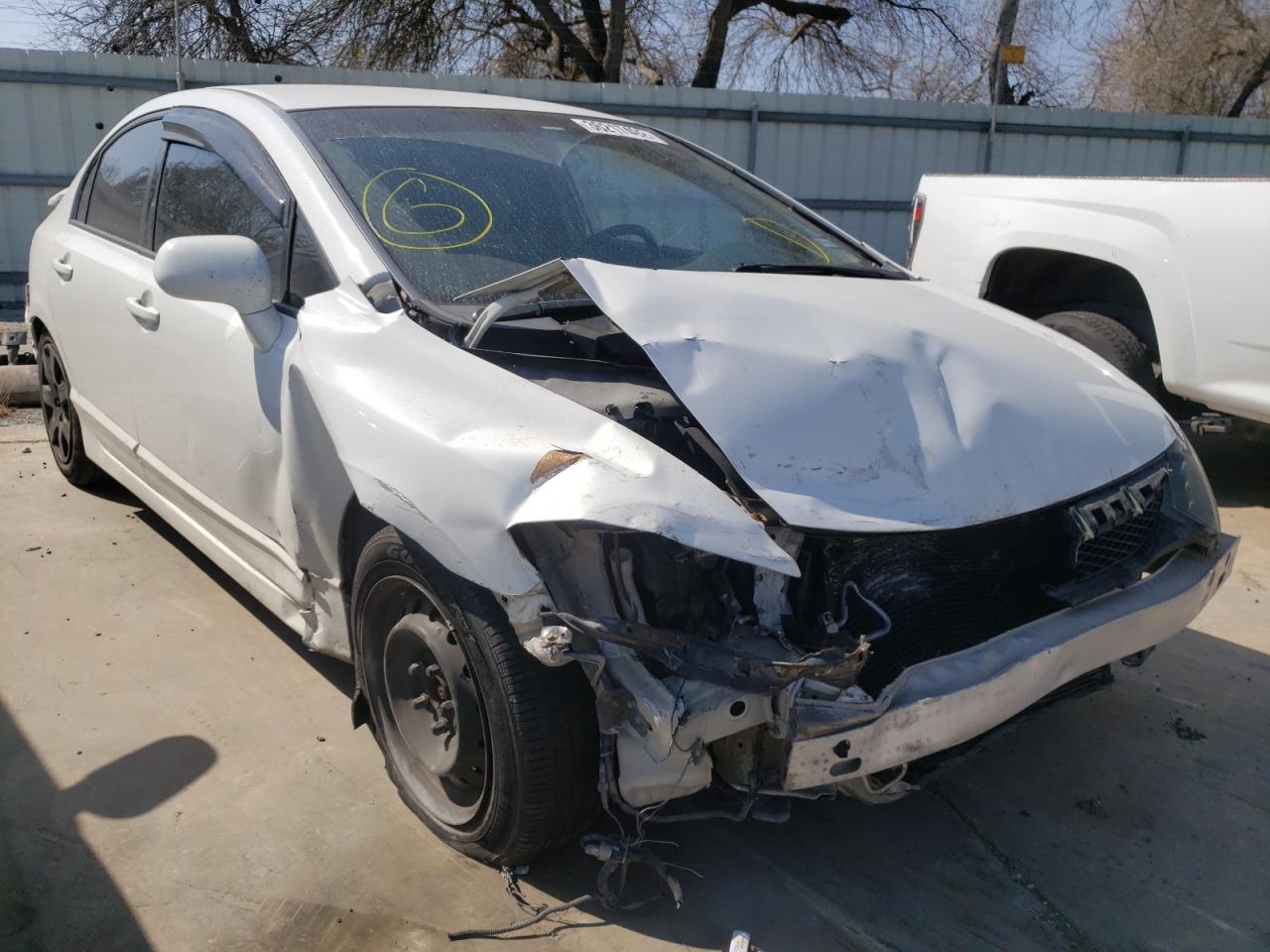 HONDA CIVIC LX 2011 with VIN 2HGFA1F53BH533945 - Photo from auction