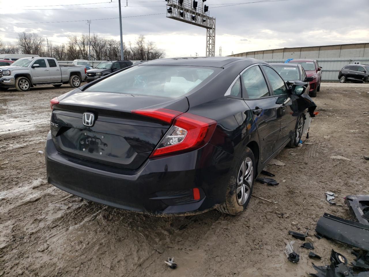Photo 4 from auction – 2018 HONDA CIVIC LX with VIN 2HGFC2F58JH564963