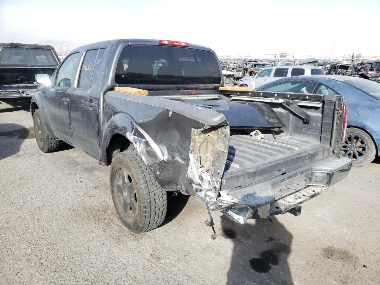Photo 3 from auction – 2005 NISSAN FRONTIER C with VIN 1N6AD07U55C461506