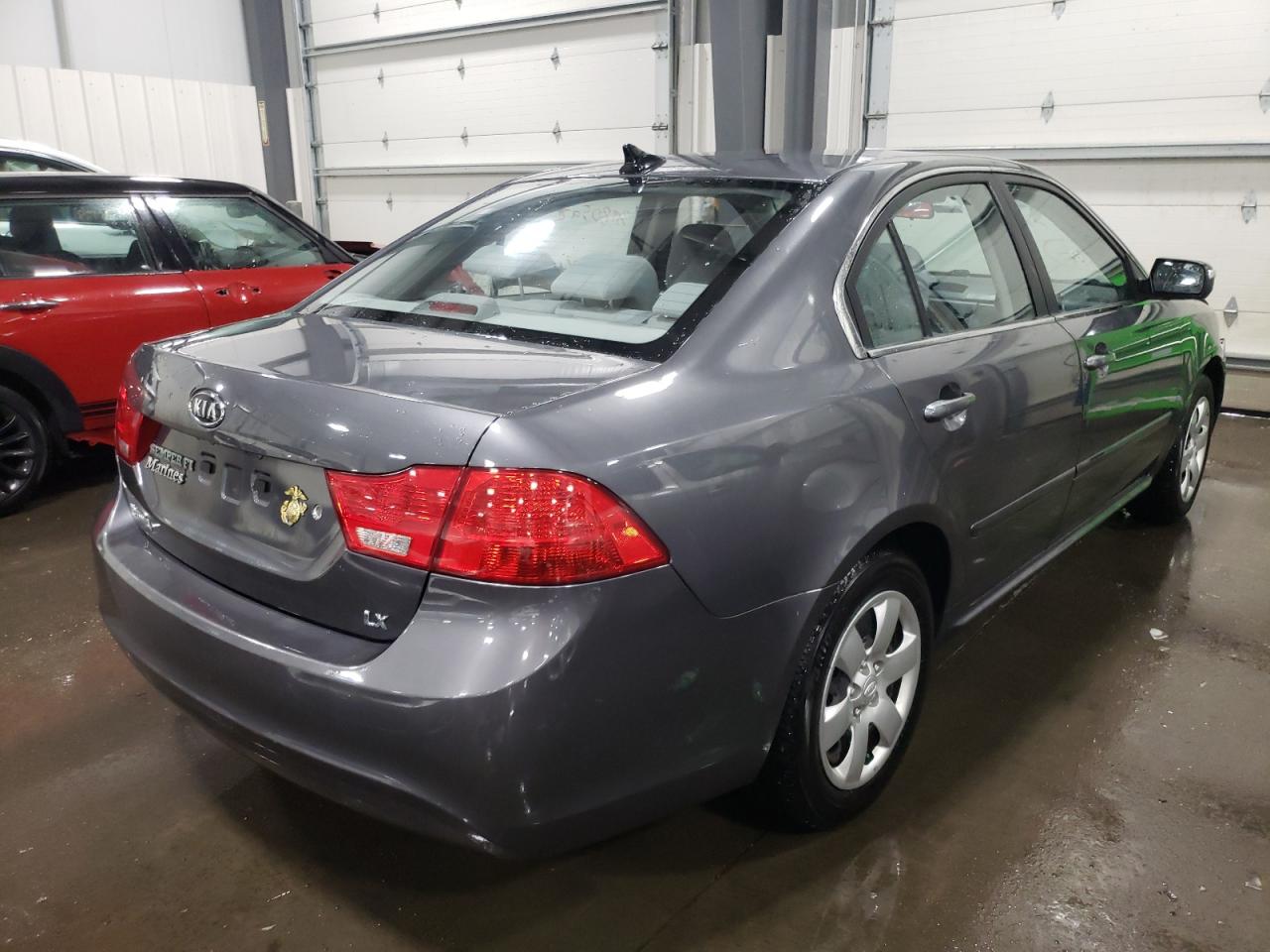 Photo 4 from auction – 2009 KIA OPTIMA with VIN KNAGE228795361219