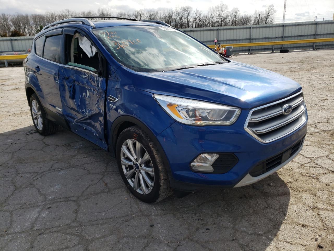 FORD ESCAPE TIT 2017 with VIN 1FMCU9J90HUC79159 - Photo from auction