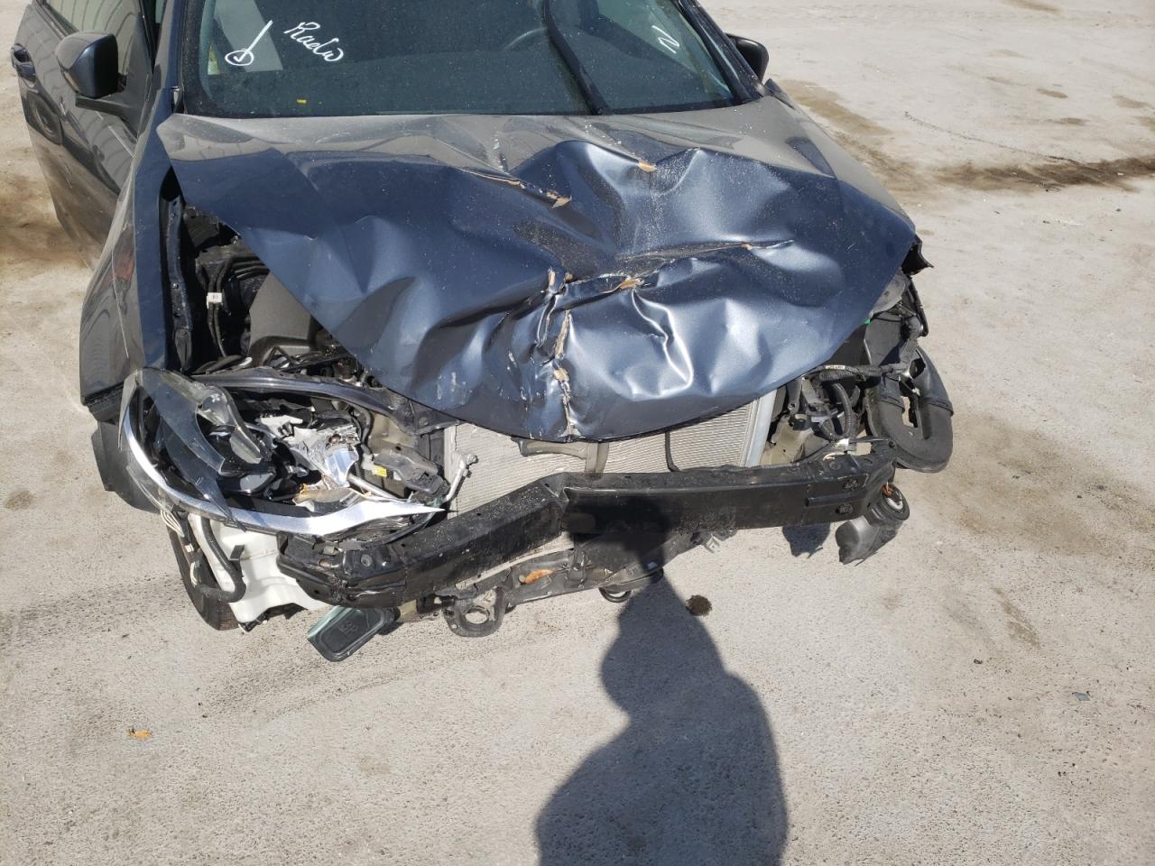 Photo 9 from auction – 2015 TOYOTA COROLLA L with VIN 5YFBURHE4FP354796
