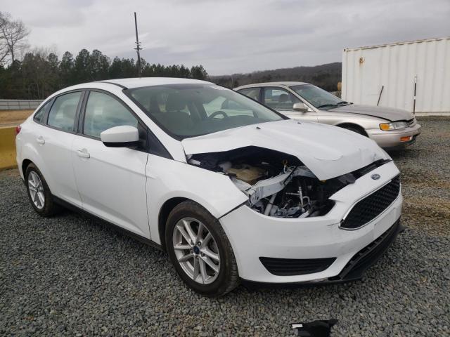 FORD FOCUS 2018 with VIN 1FADP3F28JL318624 - Photo from auction