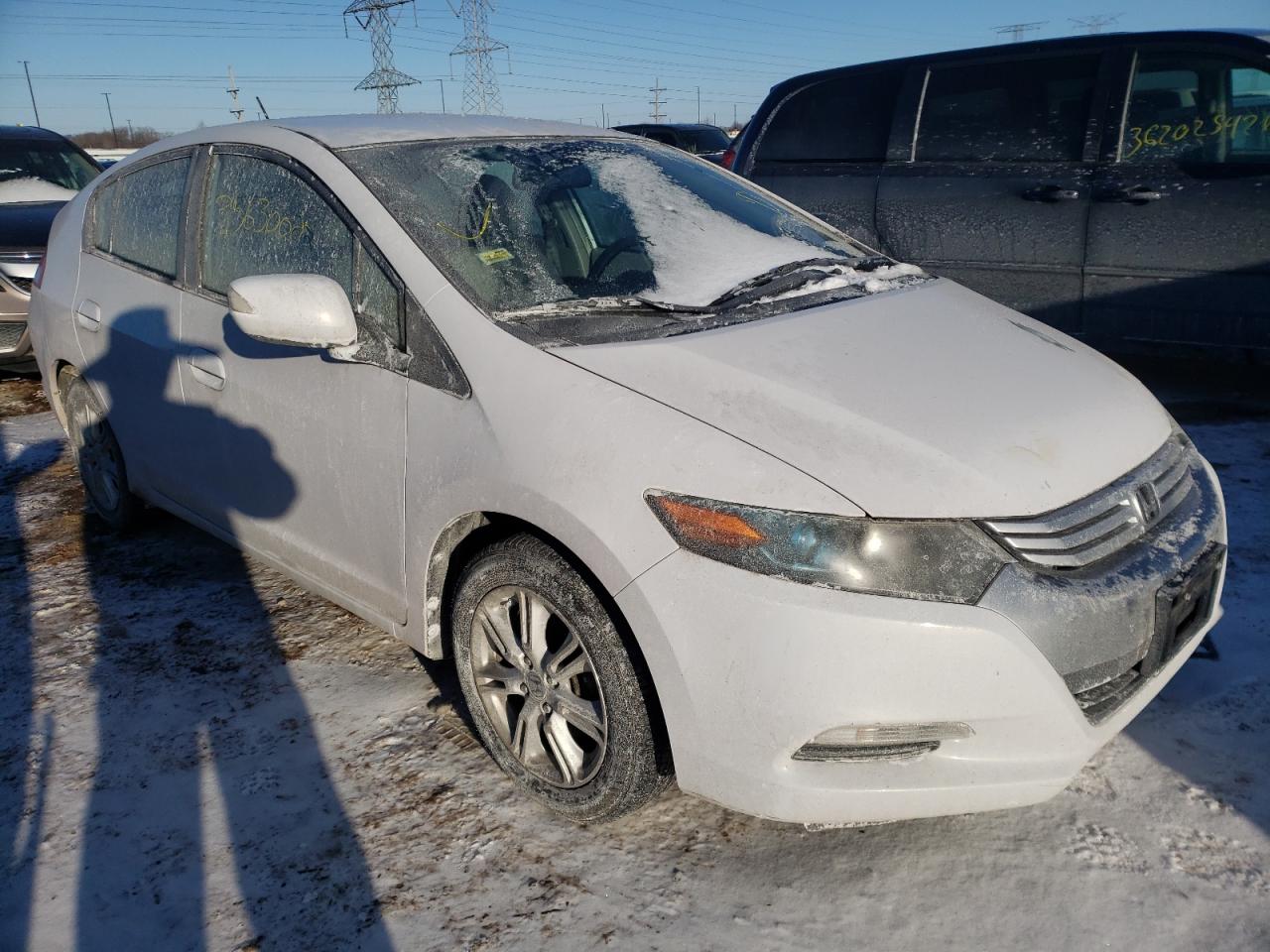 HONDA INSIGHT EX 2010 with VIN JHMZE2H73AS010631 - Photo from auction