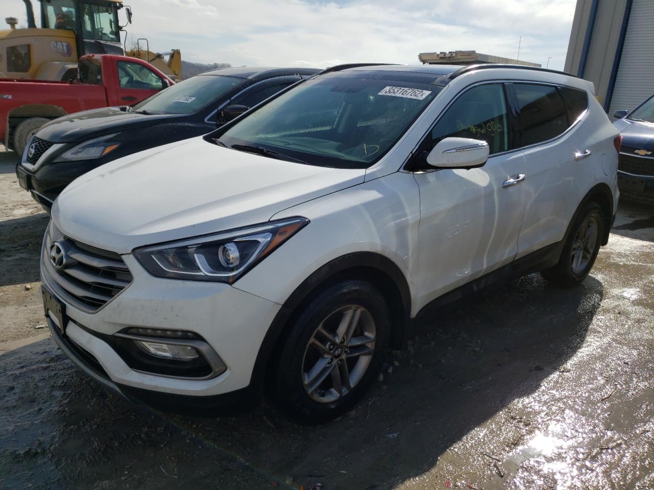 Photo 2 from auction – 2018 HYUNDAI SANTA FE S with VIN 5NMZU3LB2JH067288