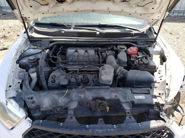 Photo 7 from auction – 2014 FORD TAURUS POL with VIN 1FAHP2L80EG154921
