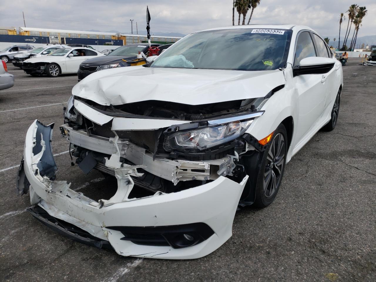 Photo 2 from auction – 2018 HONDA CIVIC EXL with VIN JHMFC1F72JX033231