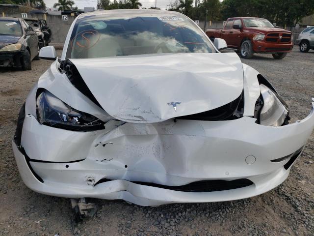 Photo 9 from auction – 2021 TESLA MODEL 3 with VIN 5YJ3E1EA4MF989658
