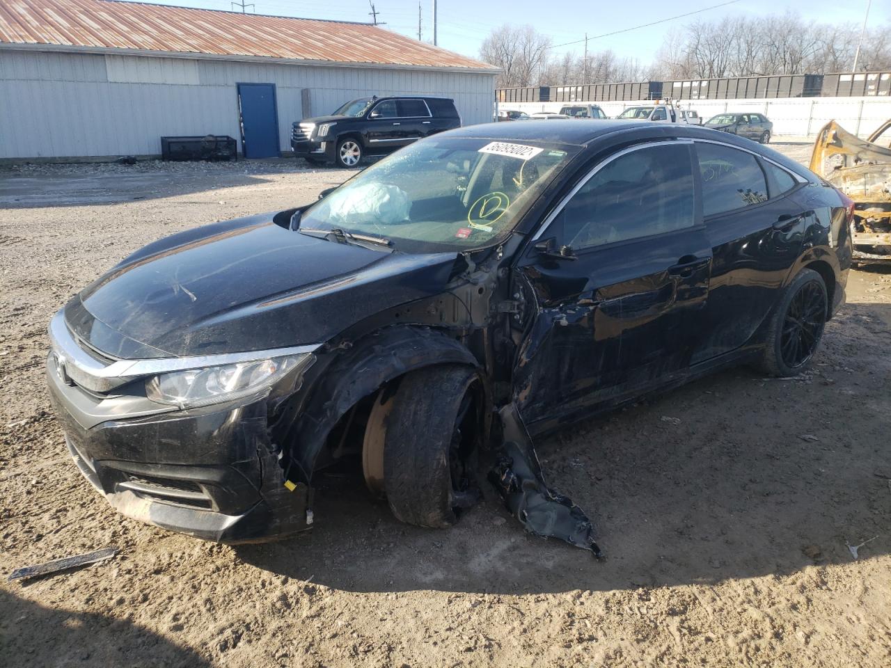 Photo 2 from auction – 2018 HONDA CIVIC LX with VIN 19XFC2F53JE013964