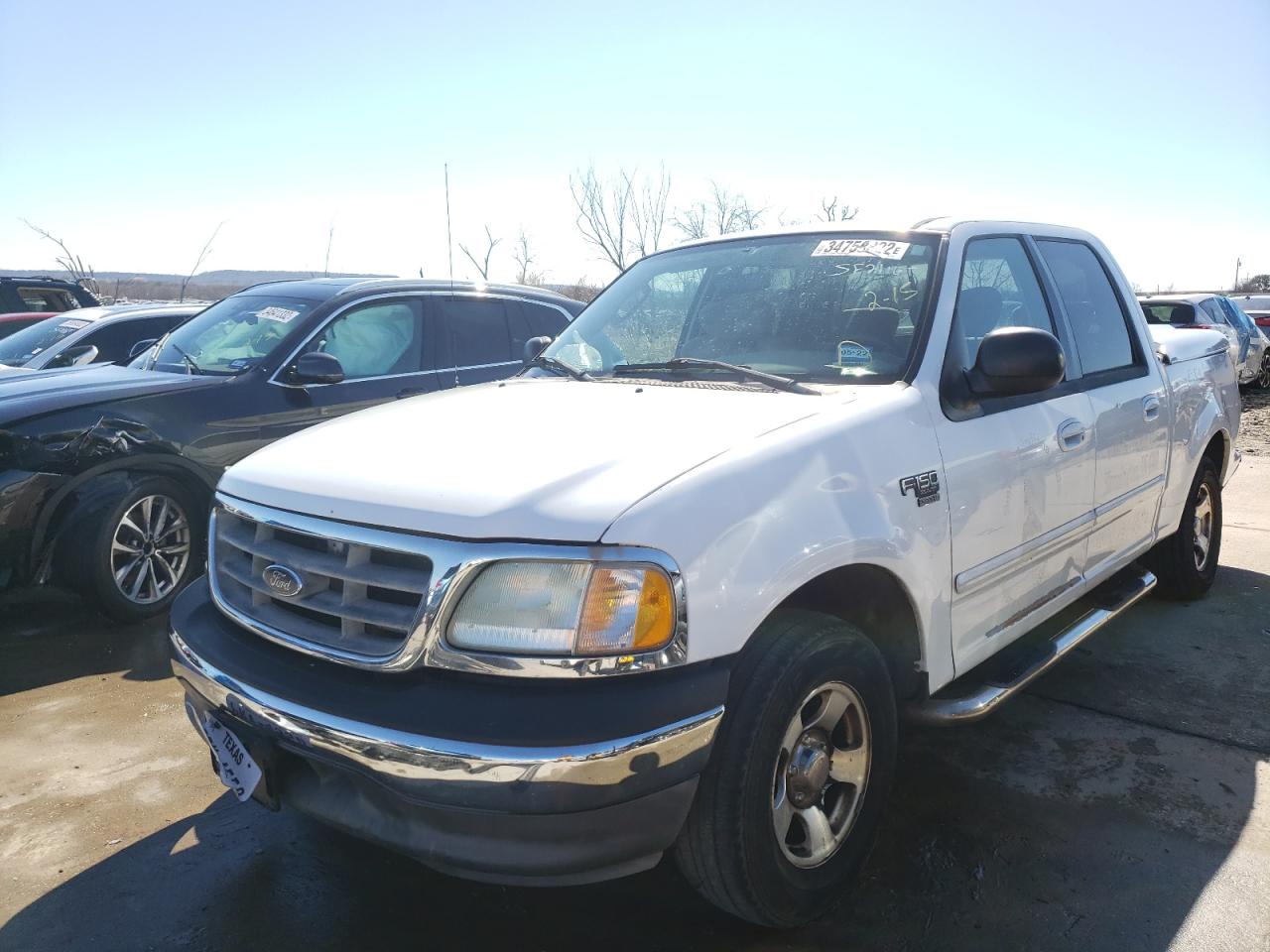Photo 2 from auction – 2003 FORD F150 SUPER with VIN 1FTRW07673KD41307