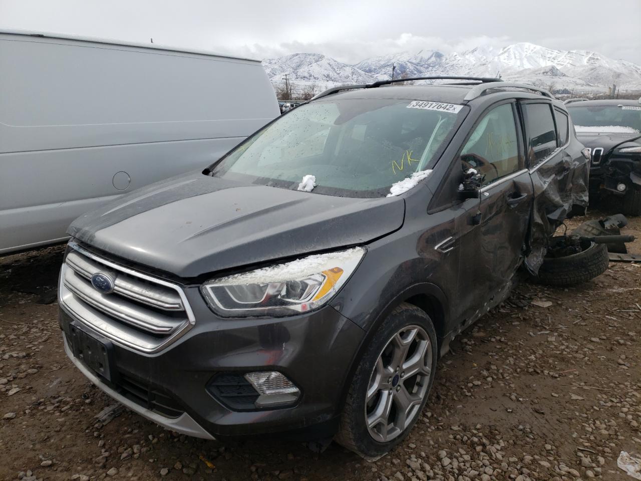Photo 2 from auction – 2017 FORD ESCAPE TIT with VIN 1FMCU9J98HUA14361