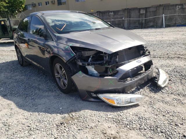 FORD FOCUS SE 2018 with VIN 1FADP3FE4JL281792 - Photo from auction