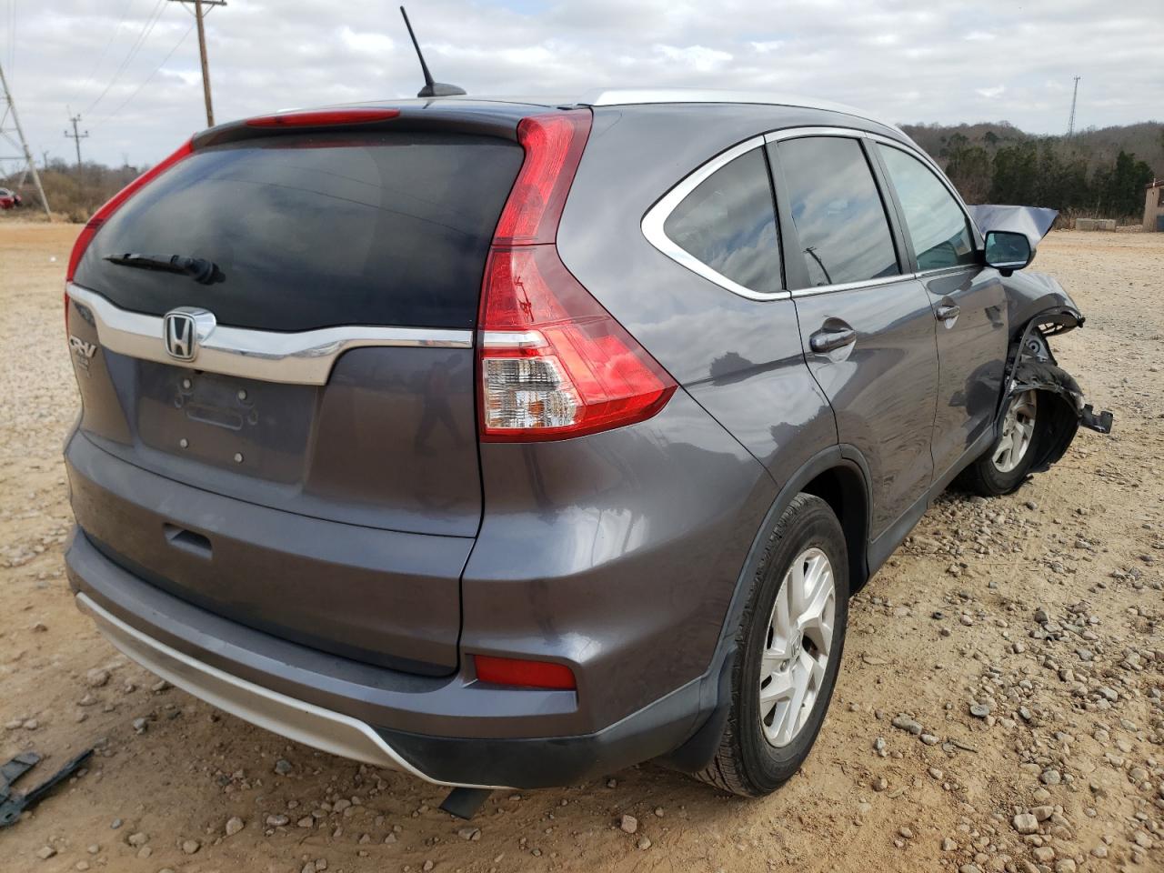 Photo 4 from auction – 2016 HONDA CR-V EXL with VIN 2HKRM3H75GH500165