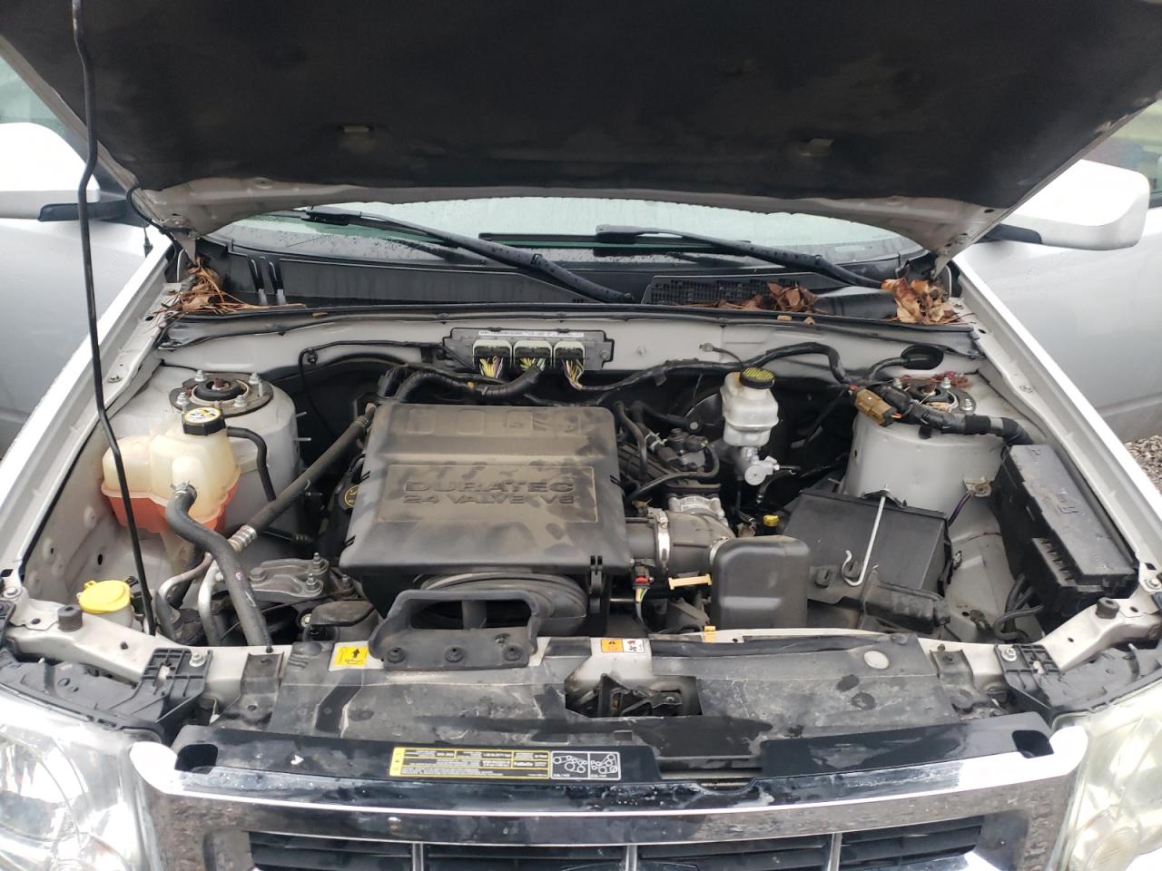 Photo 7 from auction – 2012 FORD ESCAPE LIM with VIN 1FMCU0EG3CKC55866