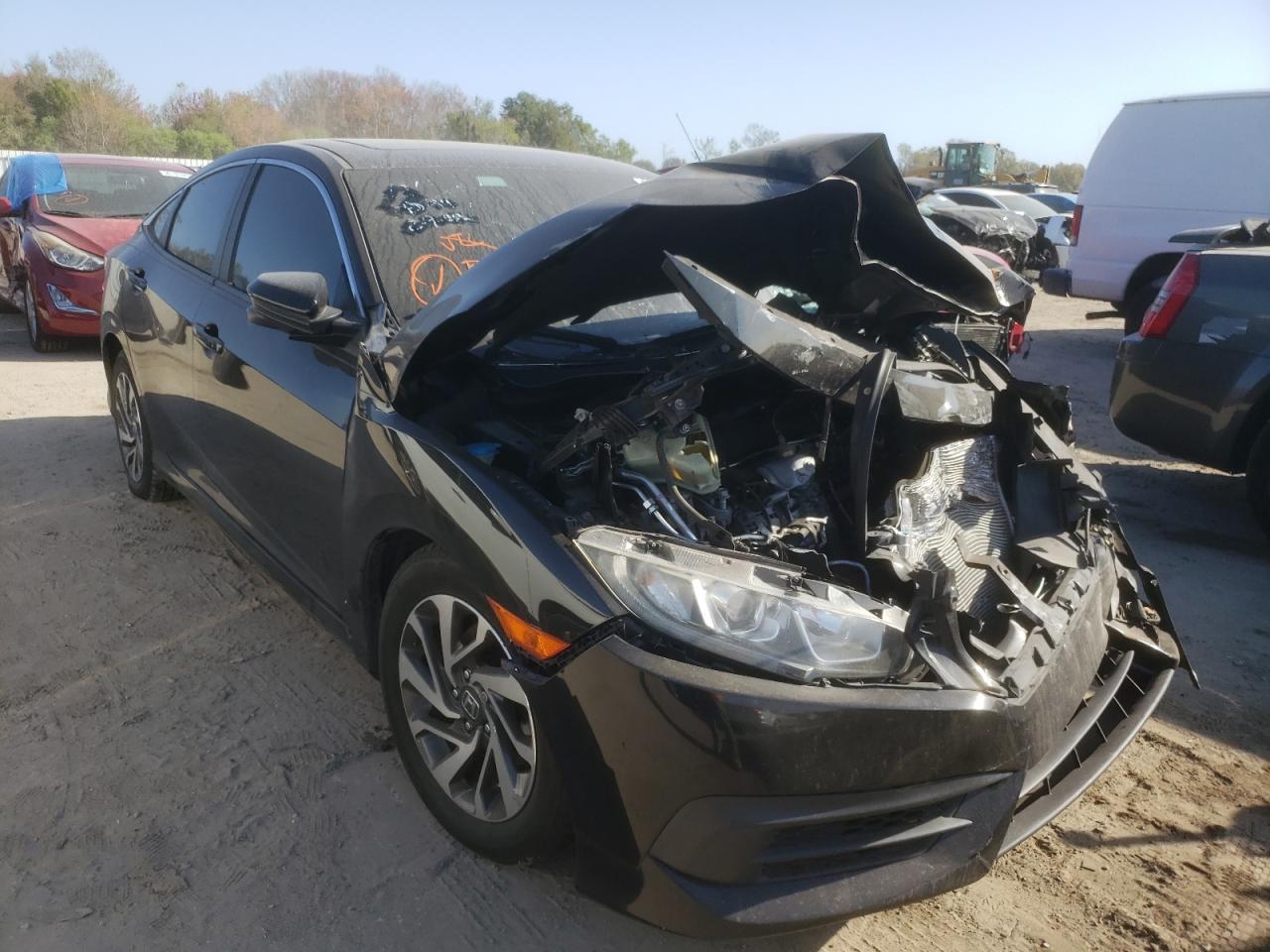HONDA CIVIC EX 2017 with VIN 19XFC2F76HE075399 - Photo from auction