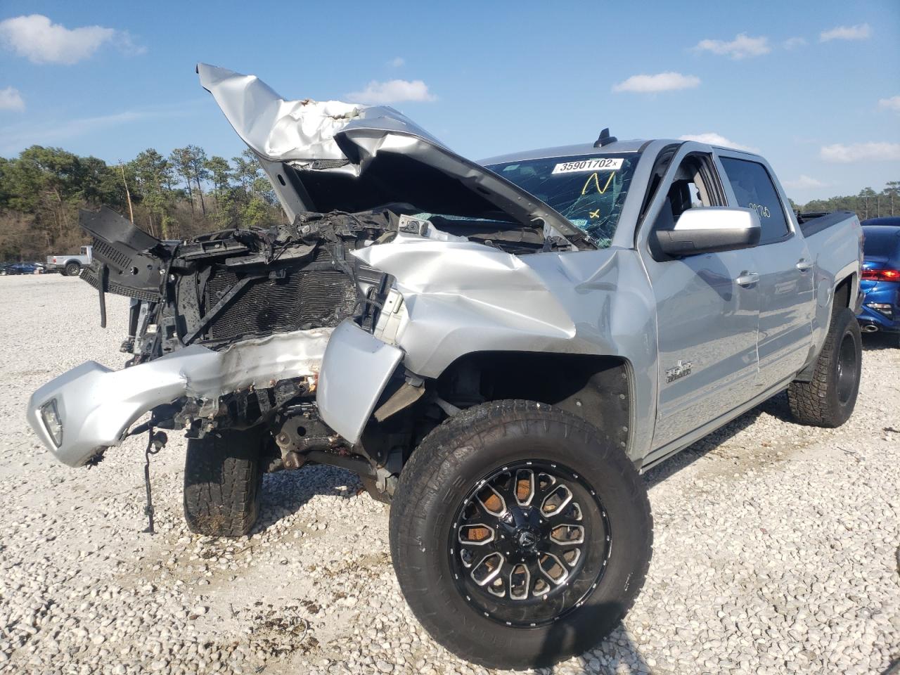 Photo 2 from auction – 2017 CHEVROLET SILVERADO with VIN 3GCUKRECXHG100570