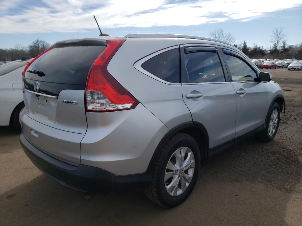 Photo 4 from auction – 2012 HONDA CR-V EXL with VIN JHLRM4H75CC010548