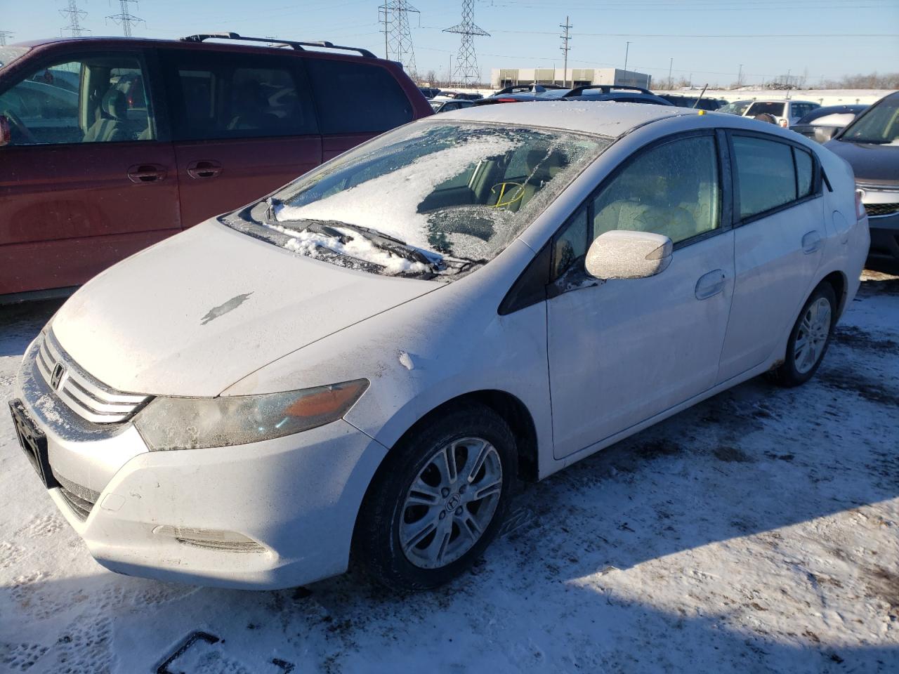 Photo 2 from auction – 2010 HONDA INSIGHT EX with VIN JHMZE2H73AS010631