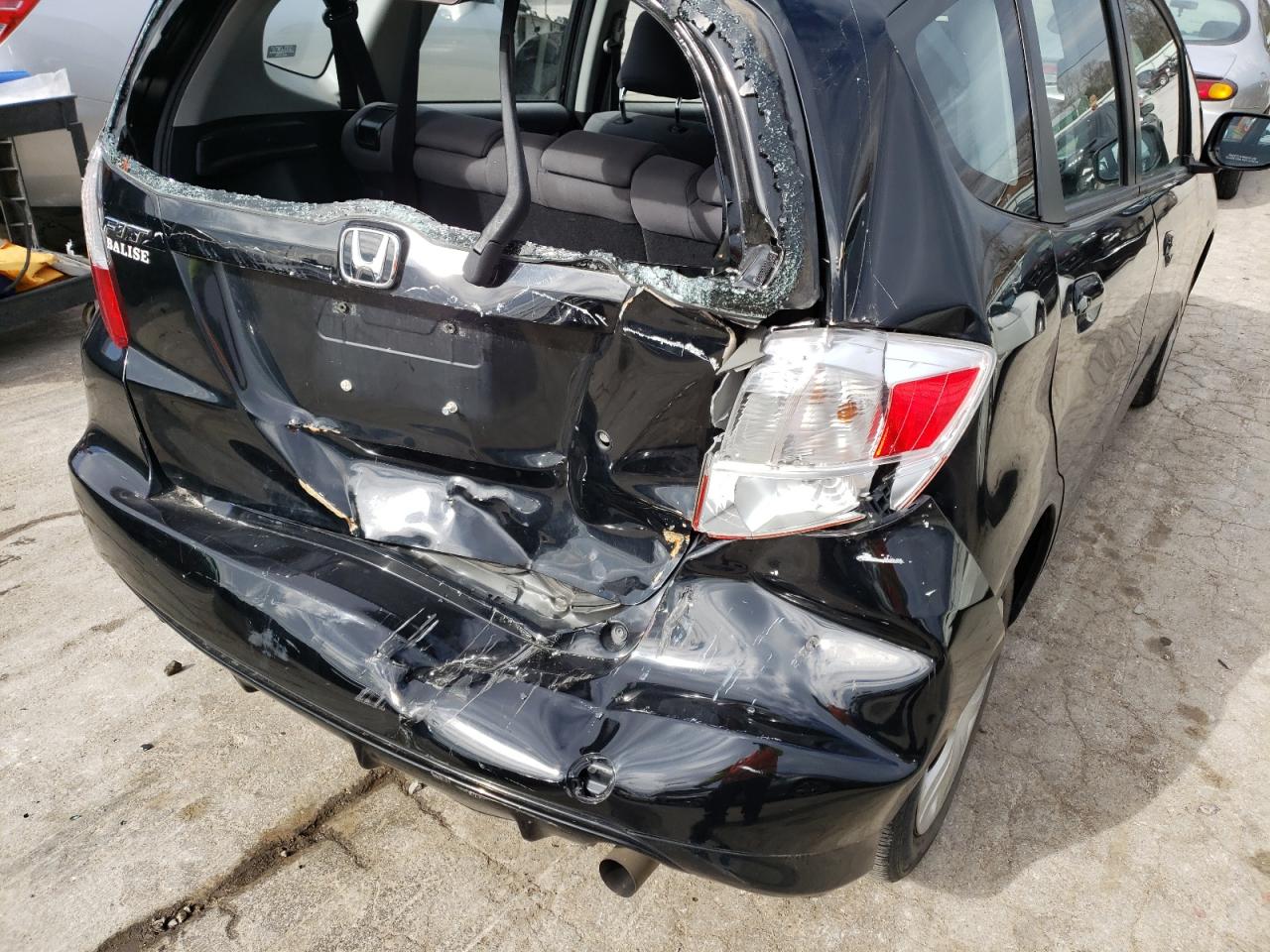 Photo 9 from auction – 2009 HONDA FIT with VIN JHMGE88219S023145