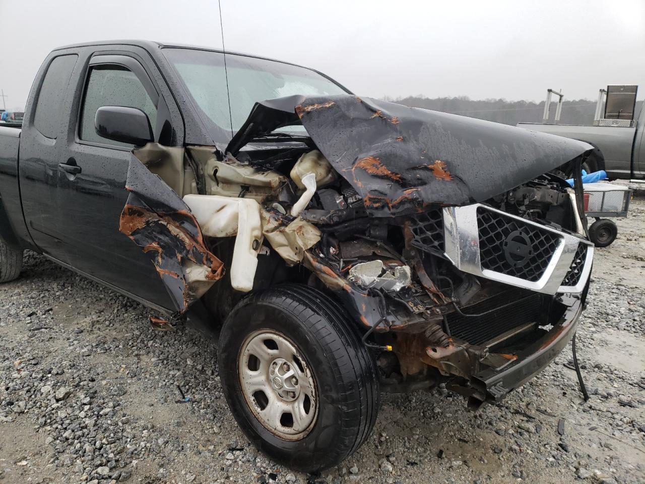 Photo 9 from auction – 2005 NISSAN FRONTIER K with VIN 1N6BD06T05C429012
