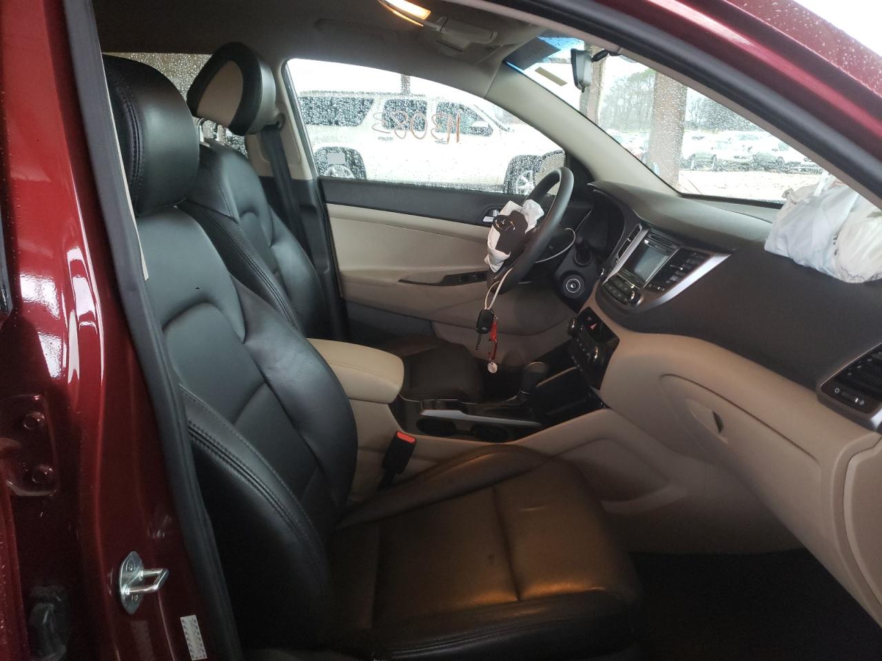 Photo 5 from auction – 2016 HYUNDAI TUCSON SE with VIN KM8J23A43GU054585