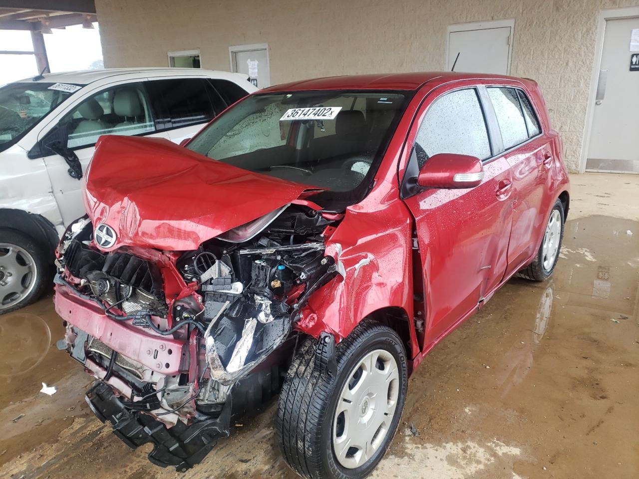 Photo 2 from auction – 2012 TOYOTA SCION XD with VIN JTKKU4B45C1027156