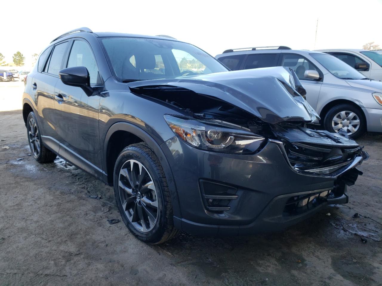 MAZDA CX-5 GT 2016 with VIN JM3KE2DY8G0719827 - Photo from auction