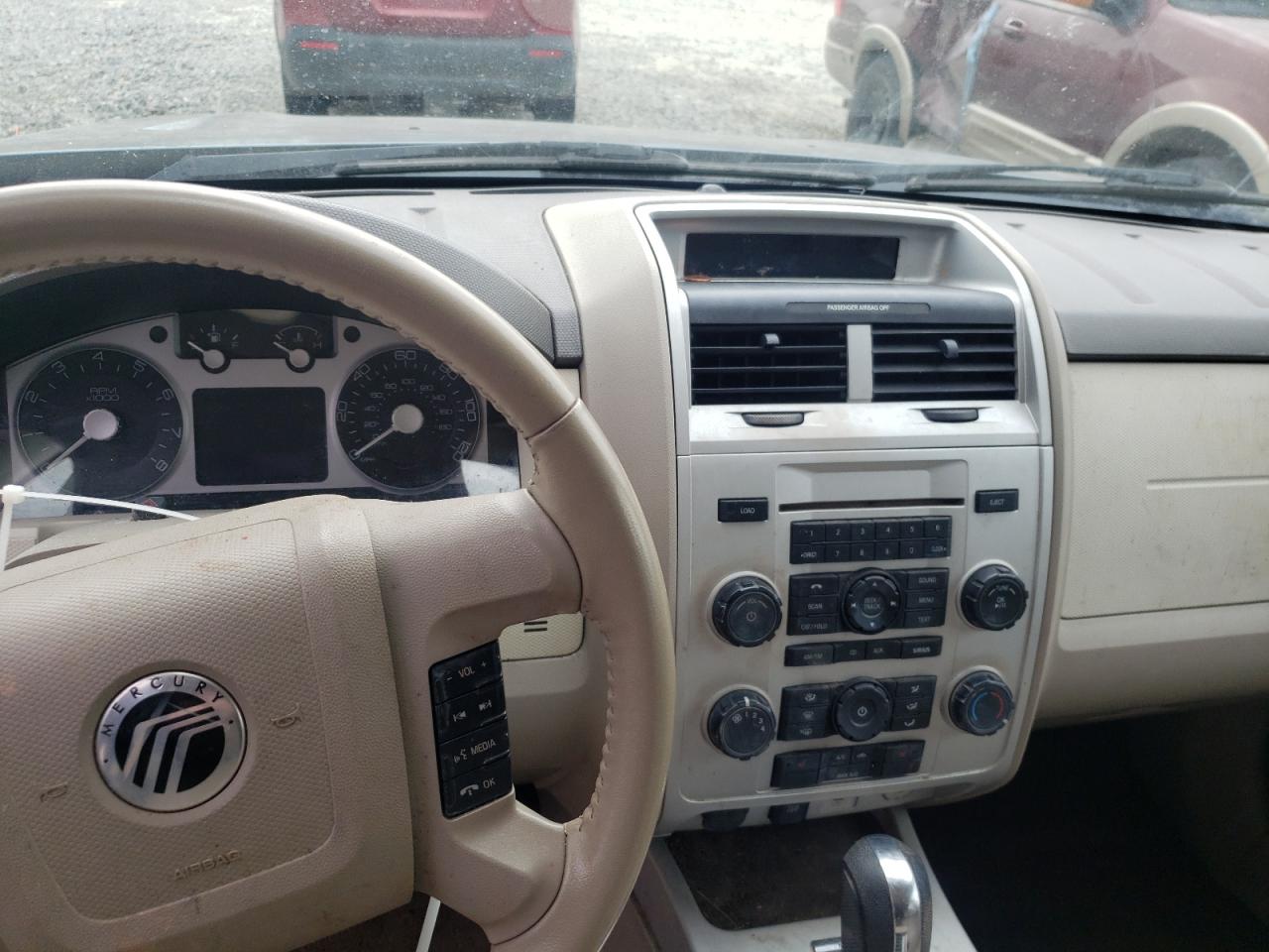 Photo 9 from auction – 2011 MERCURY MARINER with VIN 4M2CN8B79BKJ03961