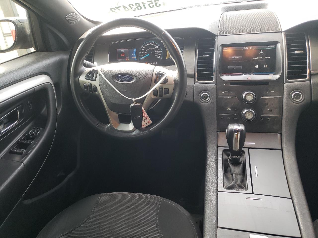 Photo 9 from auction – 2015 FORD TAURUS SEL with VIN 1FAHP2E88FG208397
