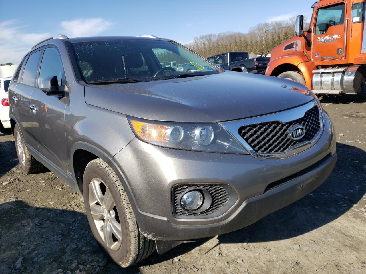 KIA SORENTO EX 2013 with VIN 5XYKUCA65DG386125 - Photo from auction