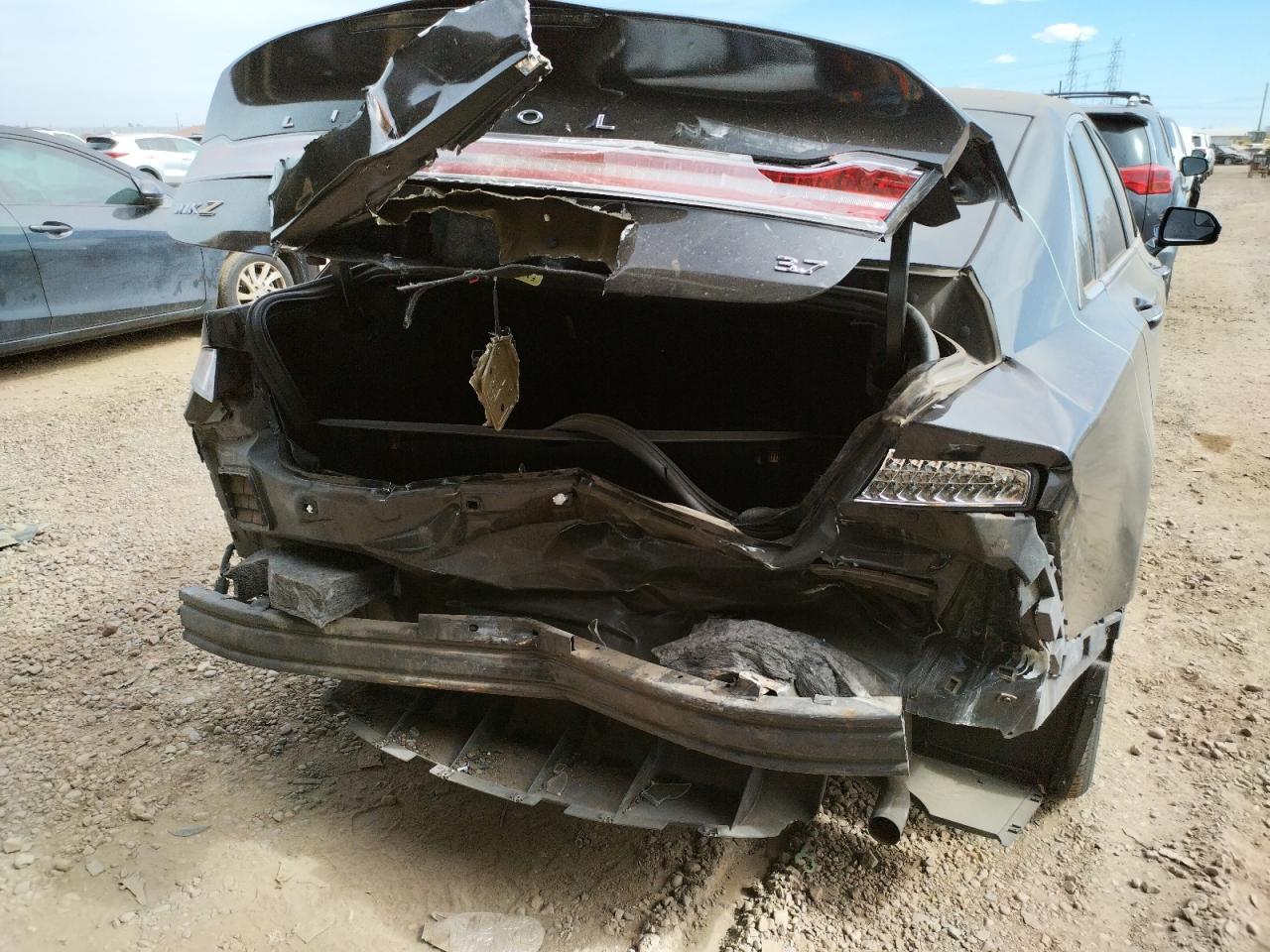 Photo 9 from auction – 2014 LINCOLN MKZ with VIN 3LN6L2GK0ER802099