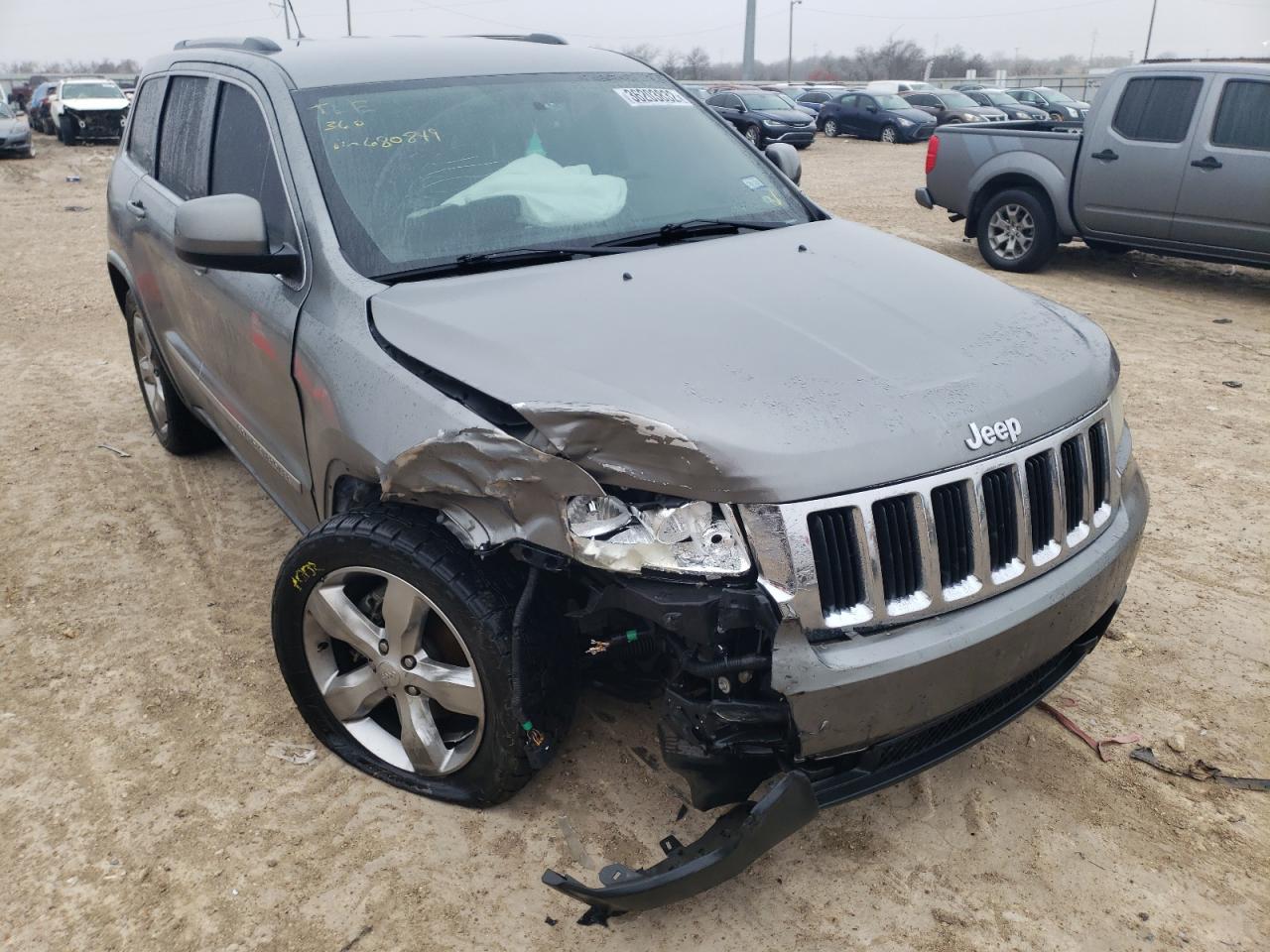JEEP GRAND CHER 2011 with VIN 1J4RR4GG3BC680849 - Photo from auction