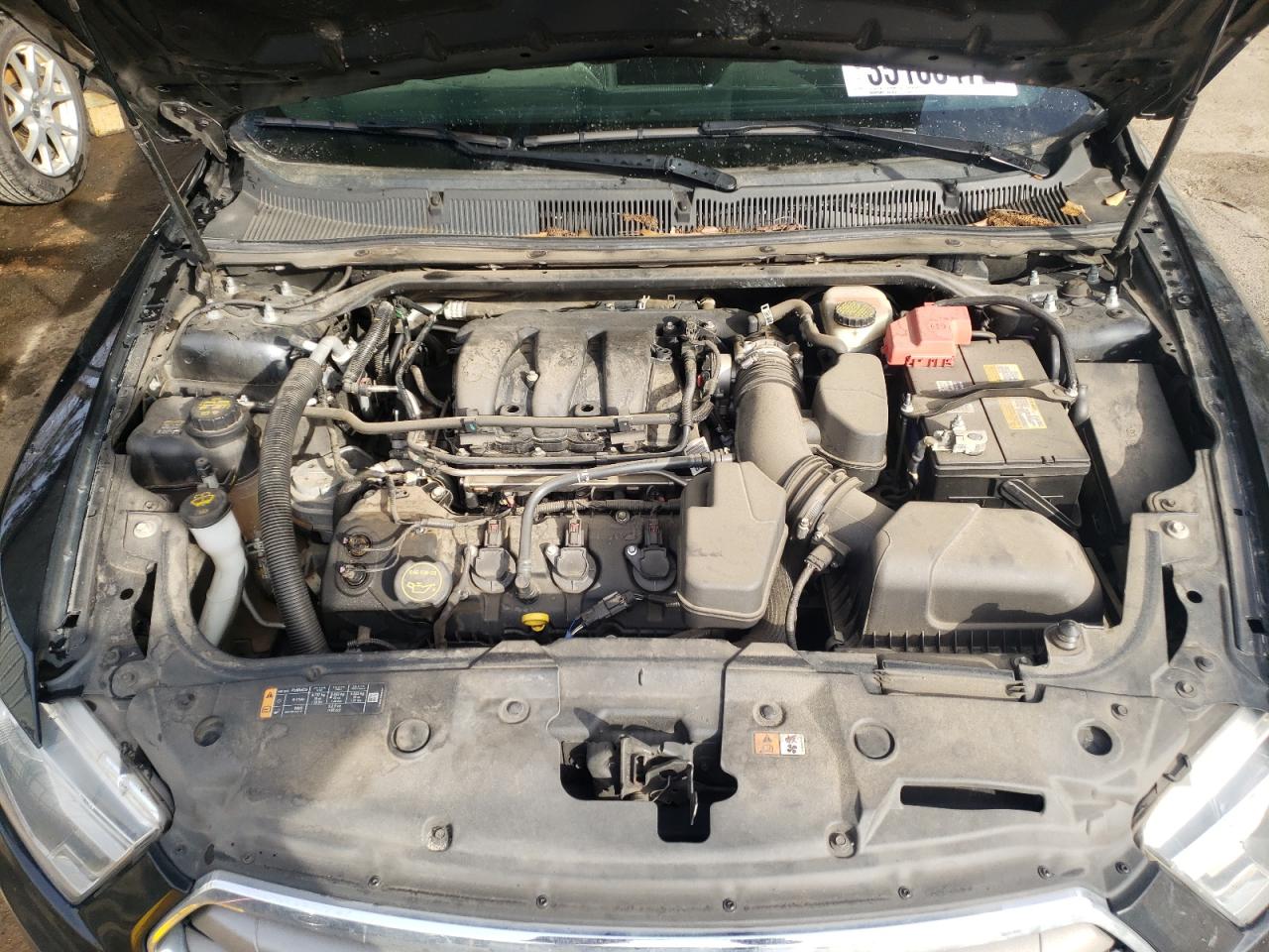 Photo 7 from auction – 2015 FORD TAURUS SEL with VIN 1FAHP2E88FG208397