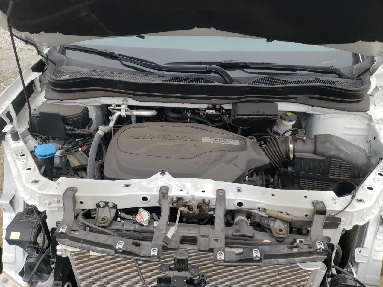 Photo 7 from auction – 2020 HONDA PASSPORT E with VIN 5FNYF7H53LB002373