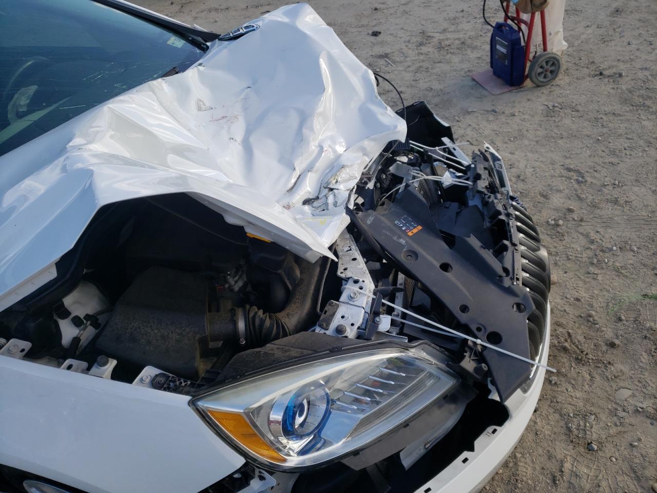 Photo 9 from auction – 2016 BUICK VERANO with VIN 1G4PP5SK7G4114016