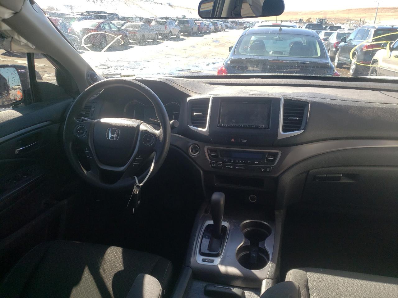 Photo 9 from auction – 2018 HONDA RIDGELINE with VIN 5FPYK3F11JB014353