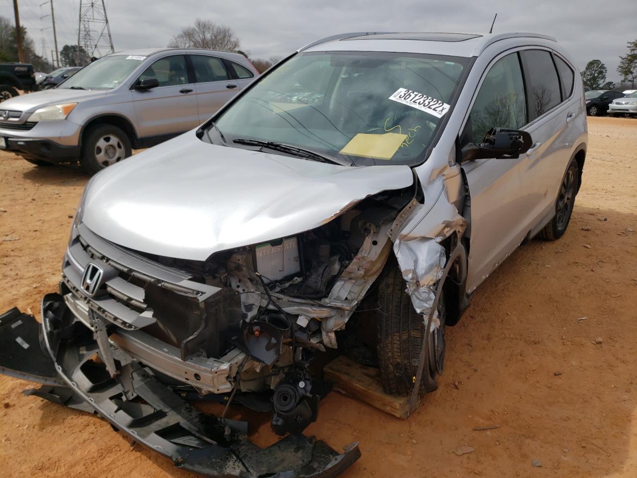 Photo 2 from auction – 2012 HONDA CR-V EXL with VIN 2HKRM3H76CH513226