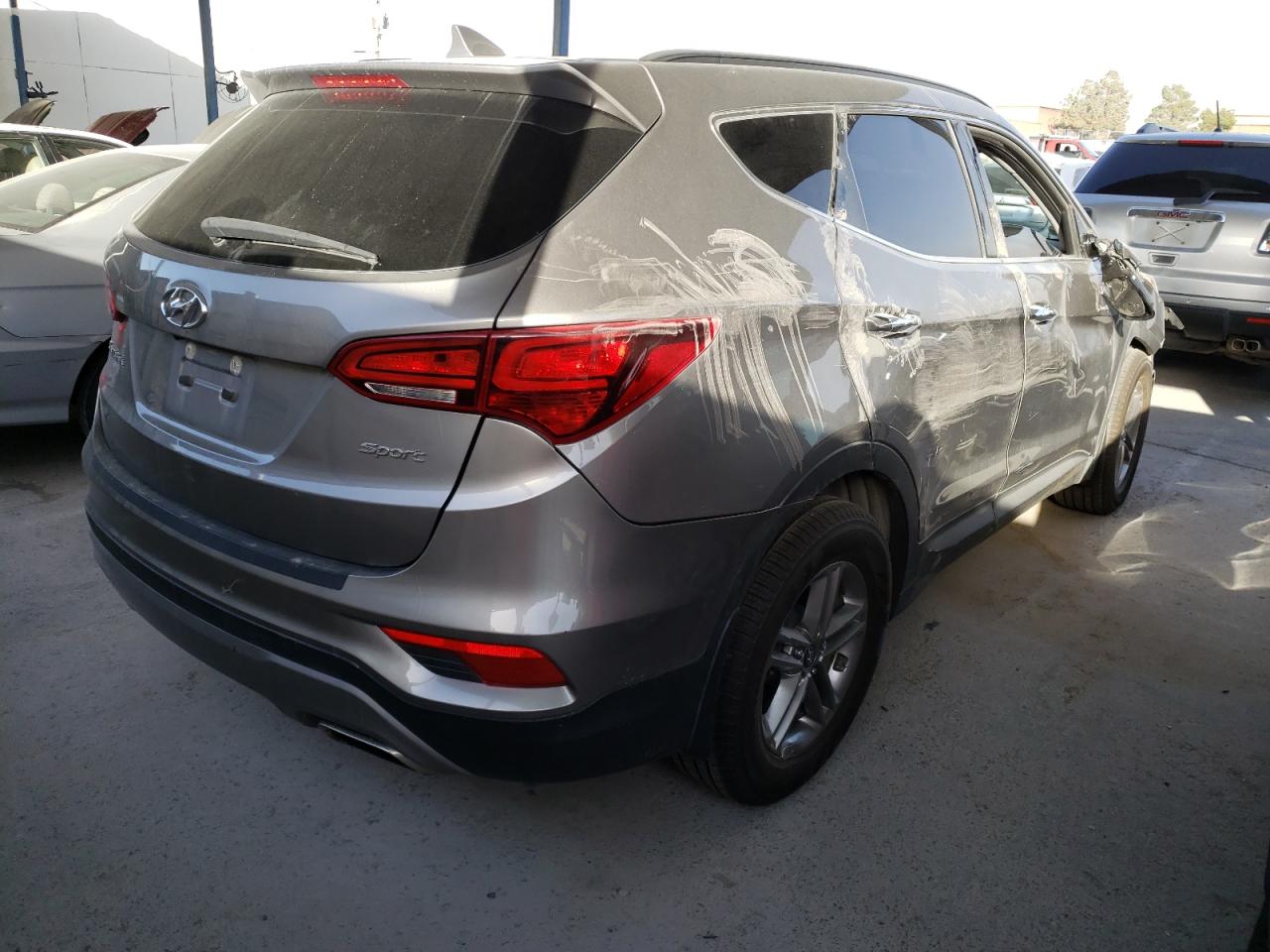 Photo 4 from auction – 2017 HYUNDAI SANTA FE S with VIN 5NMZU3LBXHH001372