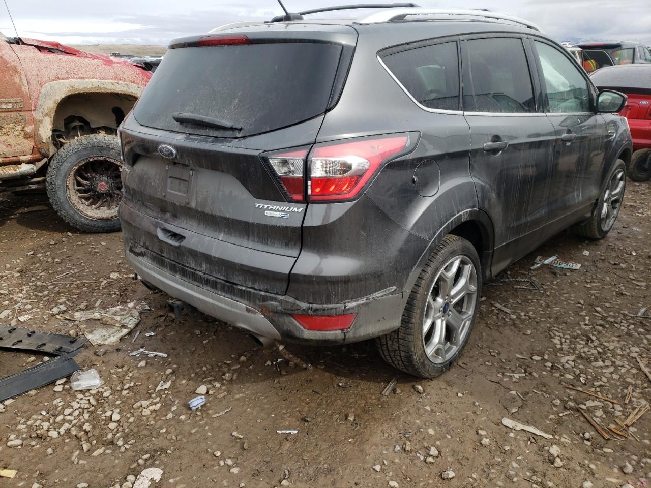 Photo 4 from auction – 2017 FORD ESCAPE TIT with VIN 1FMCU9J98HUA14361