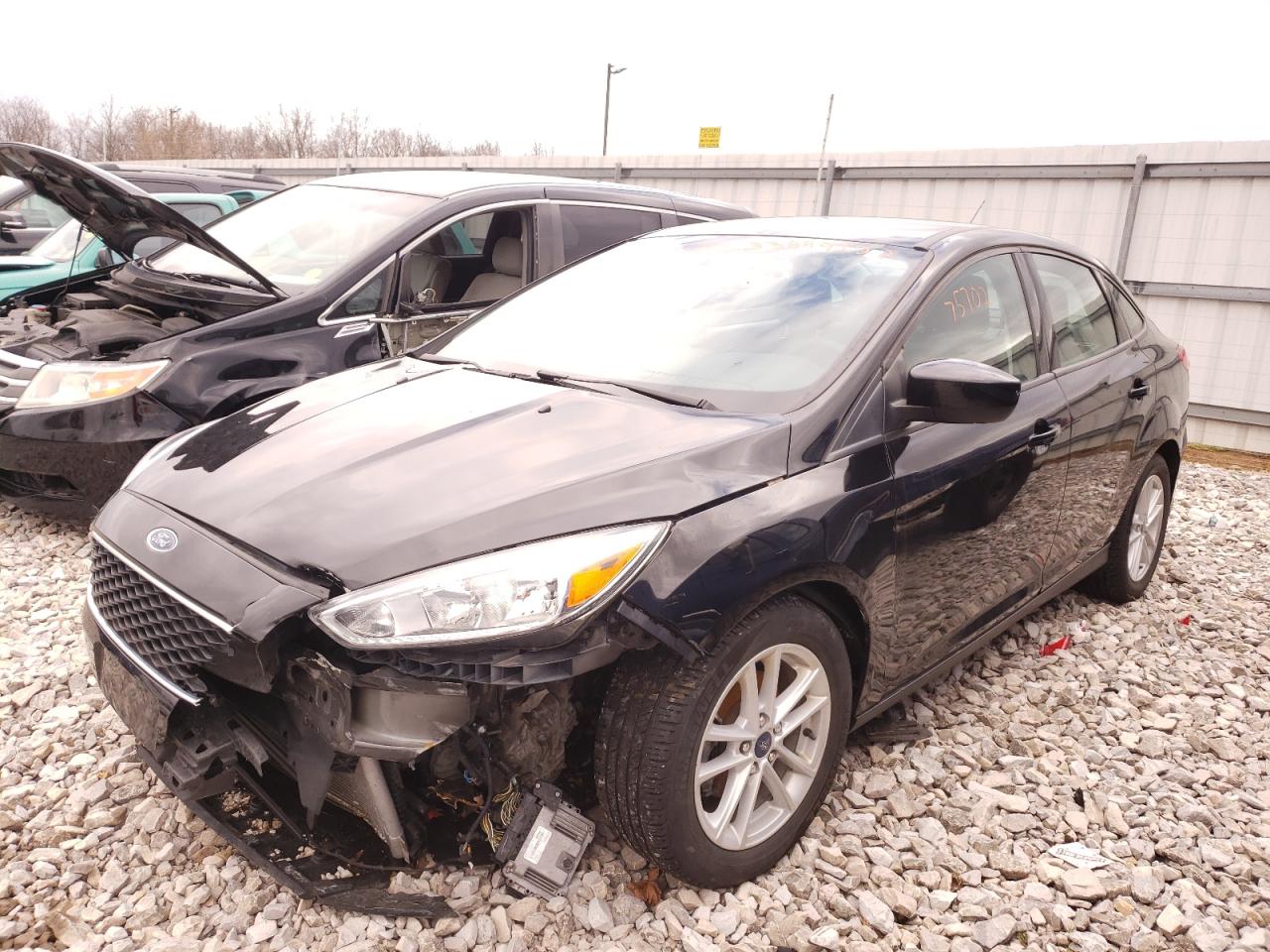 Photo 2 from auction – 2018 FORD FOCUS SE with VIN 1FADP3F23JL206765