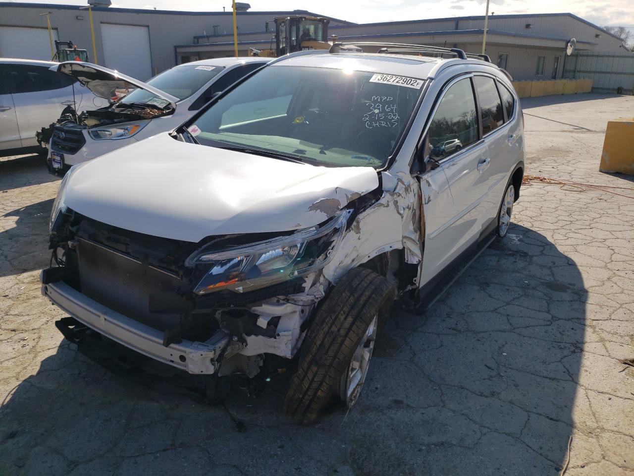 Photo 2 from auction – 2015 HONDA CR-V EXL with VIN 5J6RM3H79FL003964