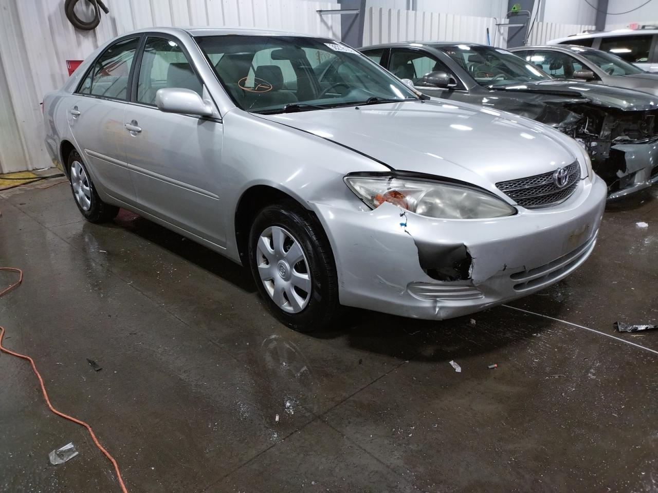 TOYOTA CAMRY LE 2004 with VIN 4T1BE32K74U879405 - Photo from auction
