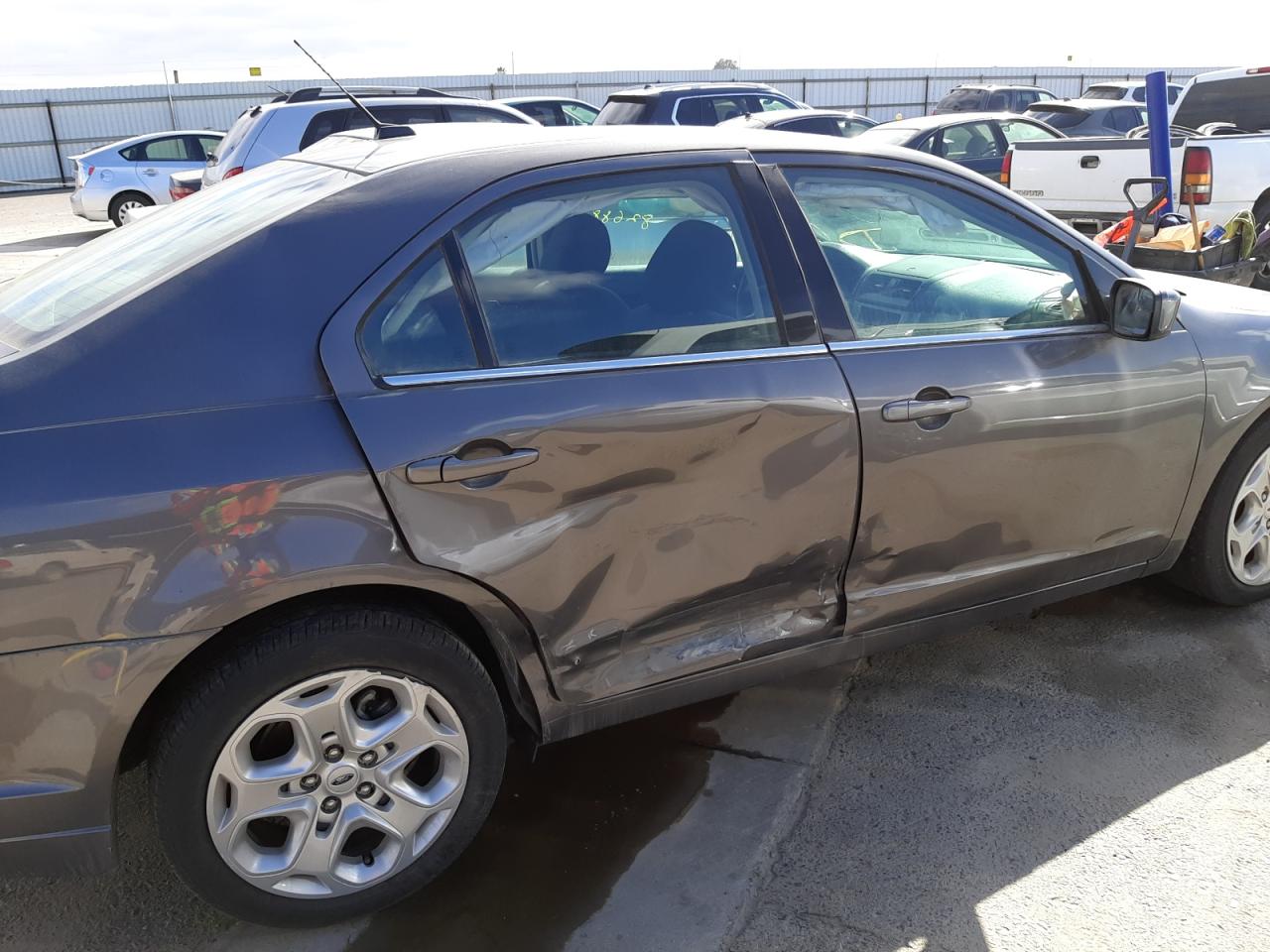 Photo 9 from auction – 2011 FORD FUSION SE with VIN 3FAHP0HA5BR178944