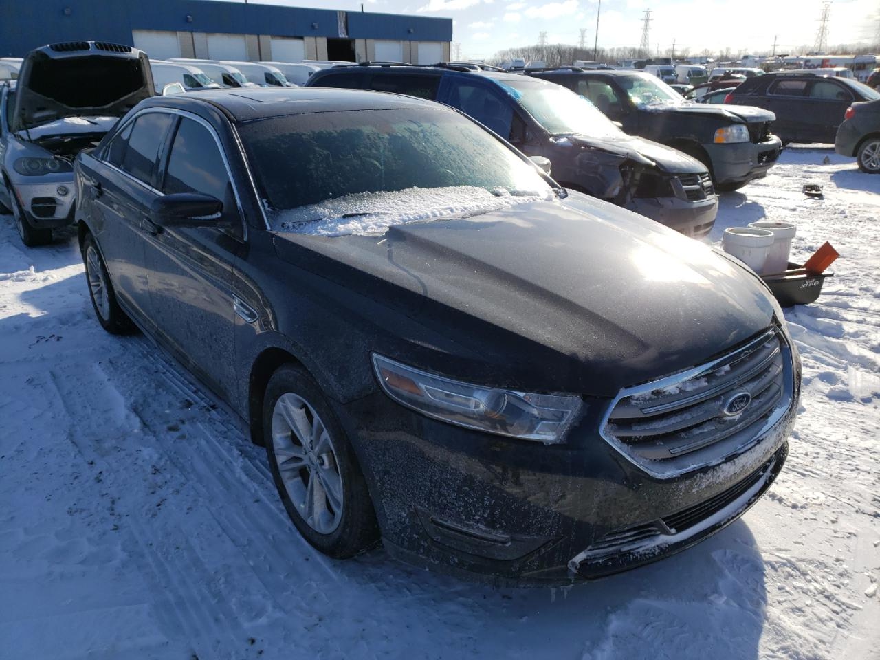 FORD TAURUS SEL 2014 with VIN 1FAHP2H82EG116437 - Photo from auction