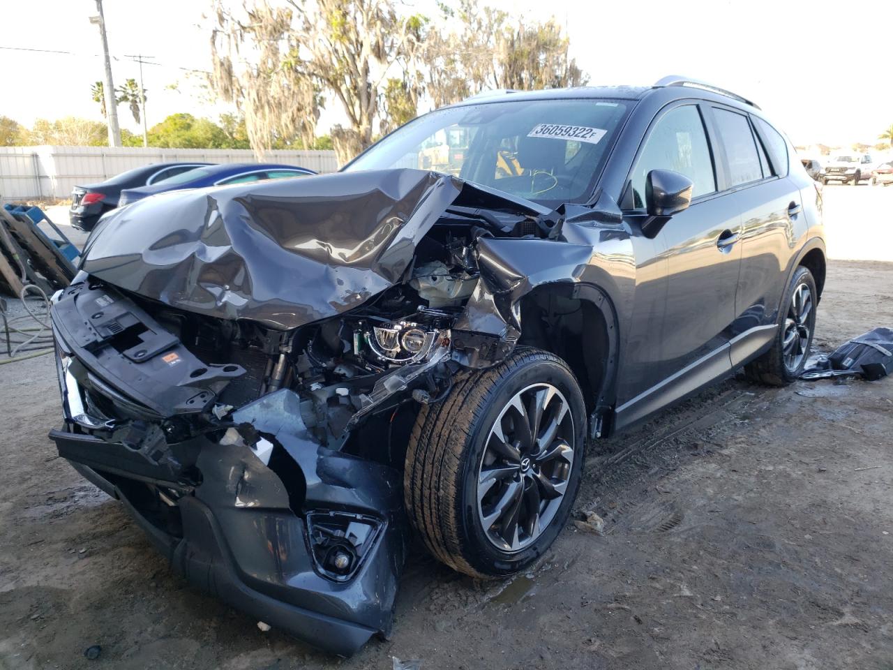 Photo 2 from auction – 2016 MAZDA CX-5 GT with VIN JM3KE2DY8G0719827