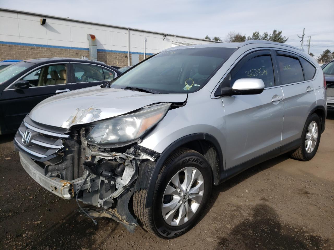 Photo 2 from auction – 2012 HONDA CR-V EXL with VIN JHLRM4H75CC010548